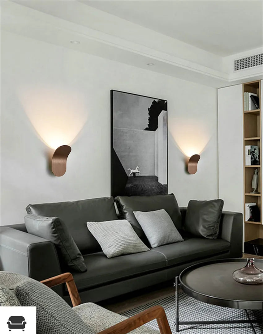 Two Nordic Glow Wall Lamps lighting a modern living room