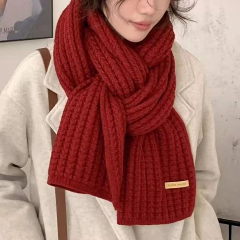 Woman wearing the red Chunky Knit Scarf