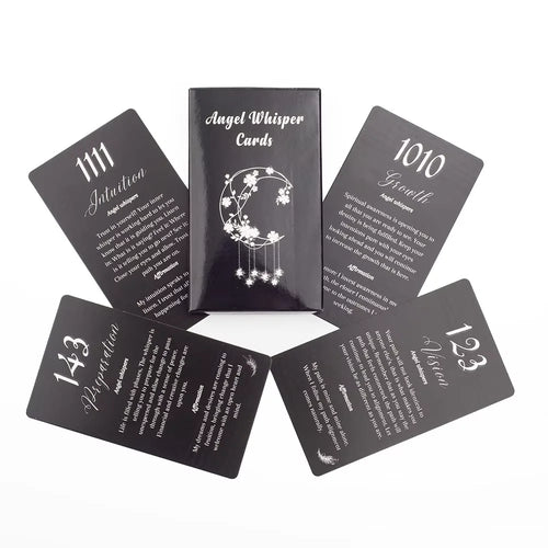 Angel Number Affirmation Cards fanned out, showing black and white card designs