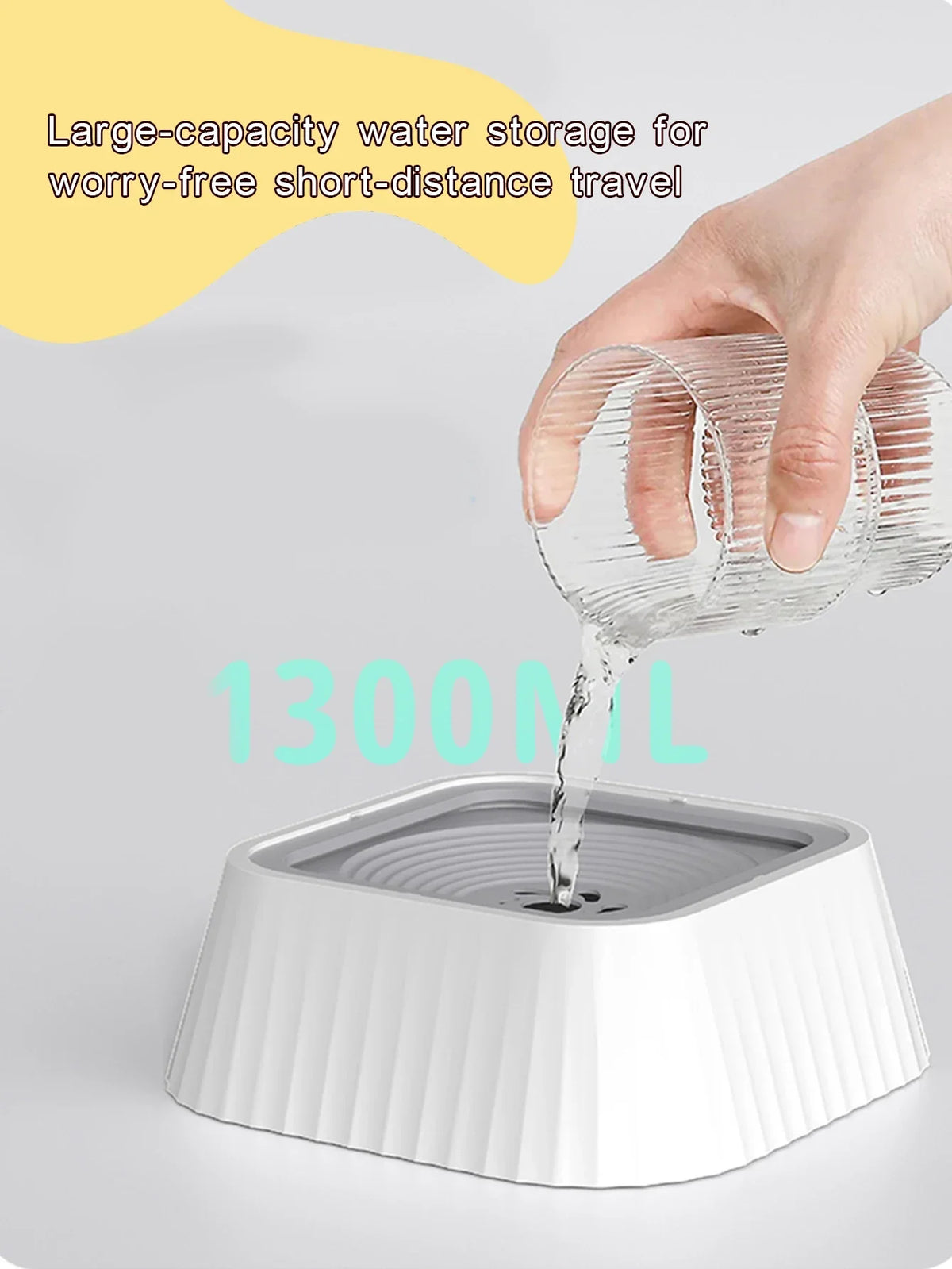 Pouring water into the No-Spill Floating Dog Water Bowl