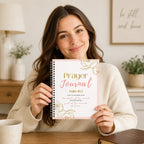 Woman holding the Guided Prayer Journal