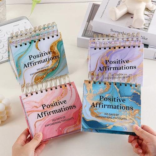 Hands holding two 365 Day Affirmation Flip Calendars