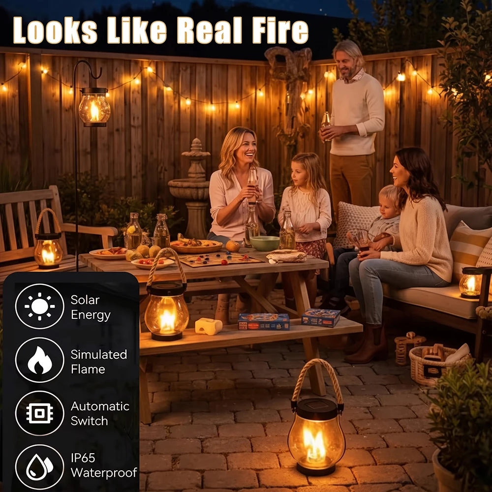 Solar Flickering Flame Lanterns lighting an outdoor patio dinner