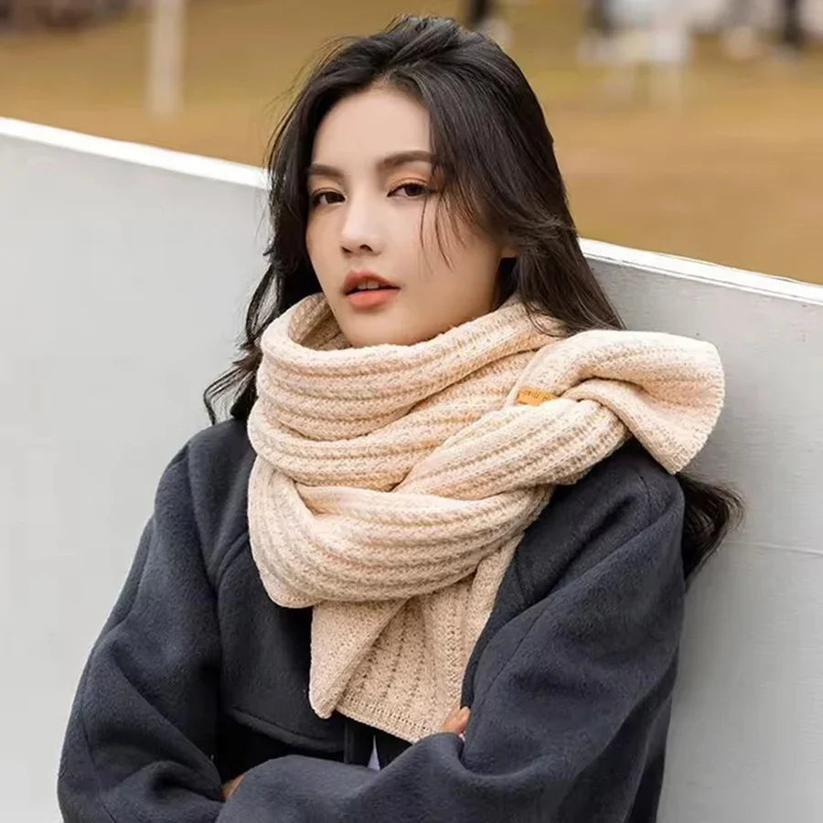 Woman wearing the beige Chunky Knit Scarf outdoors